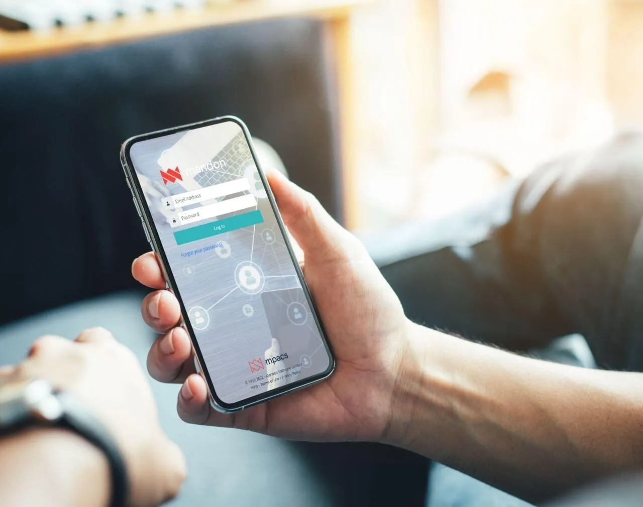 The SmartSurv surveyor app on a phone